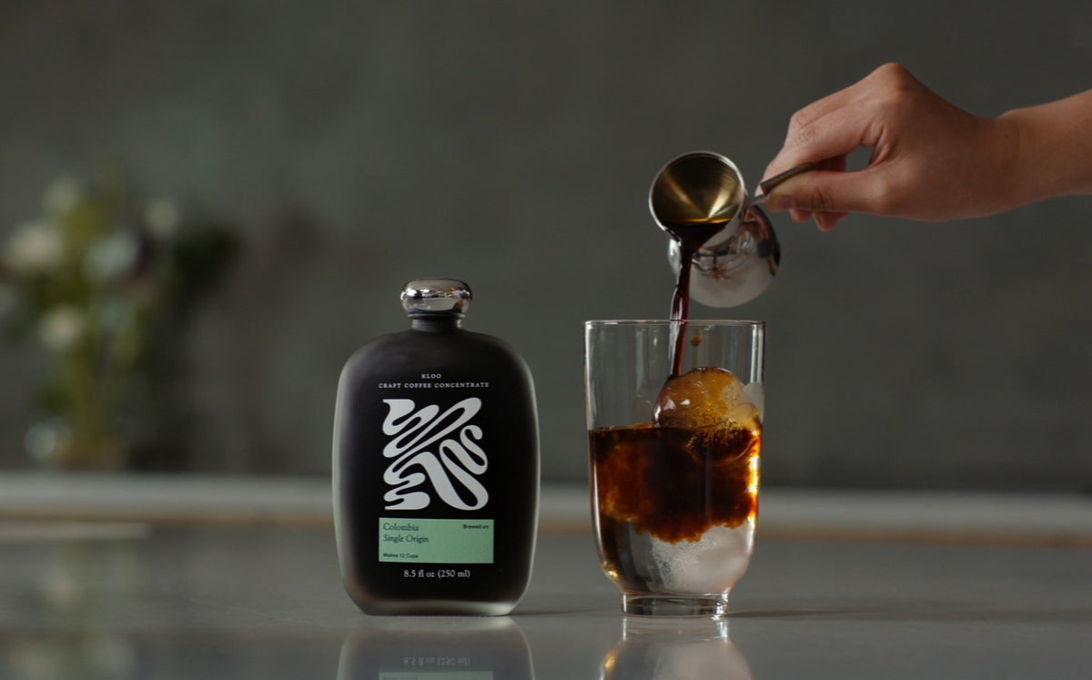 Kloo coffee concentrate pouring over ice